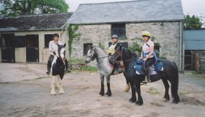 riders in a stable yard